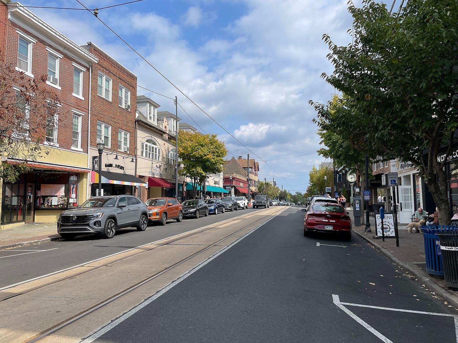 State Street in downtown Media, with shops and the trolley line
