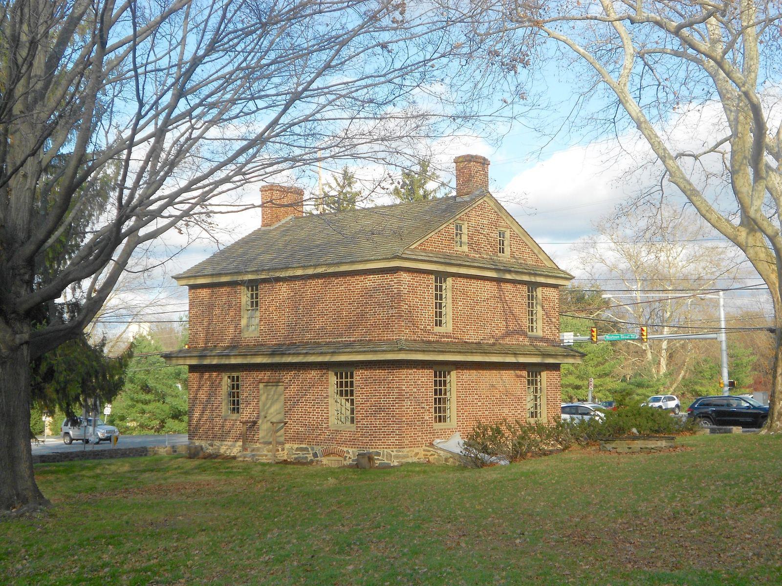 The Square Tavern, a two-story brick colonial building in Newtown Square
