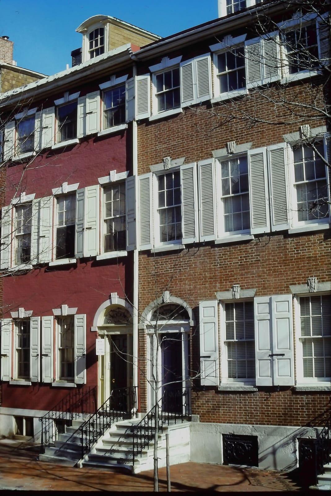 Federal-style brick row houses with shutters in Society Hill, Philadelphia