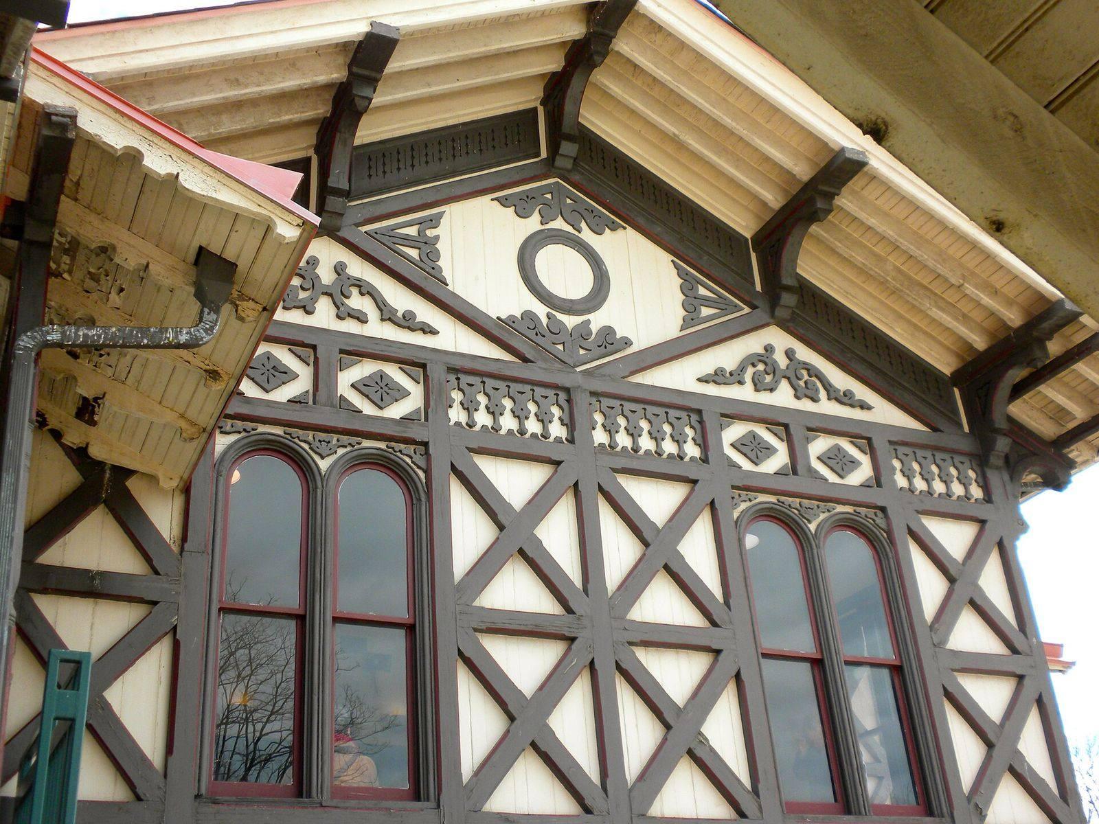 Decorative half-timbered gable and arched windows of the Victorian-era Strafford train station