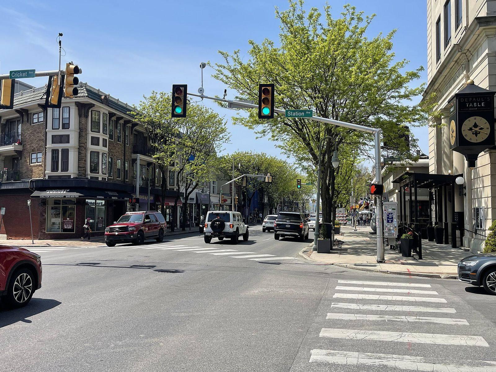 Shops and mixed-use buildings at an intersection on Lancaster Avenue in downtown Ardmore