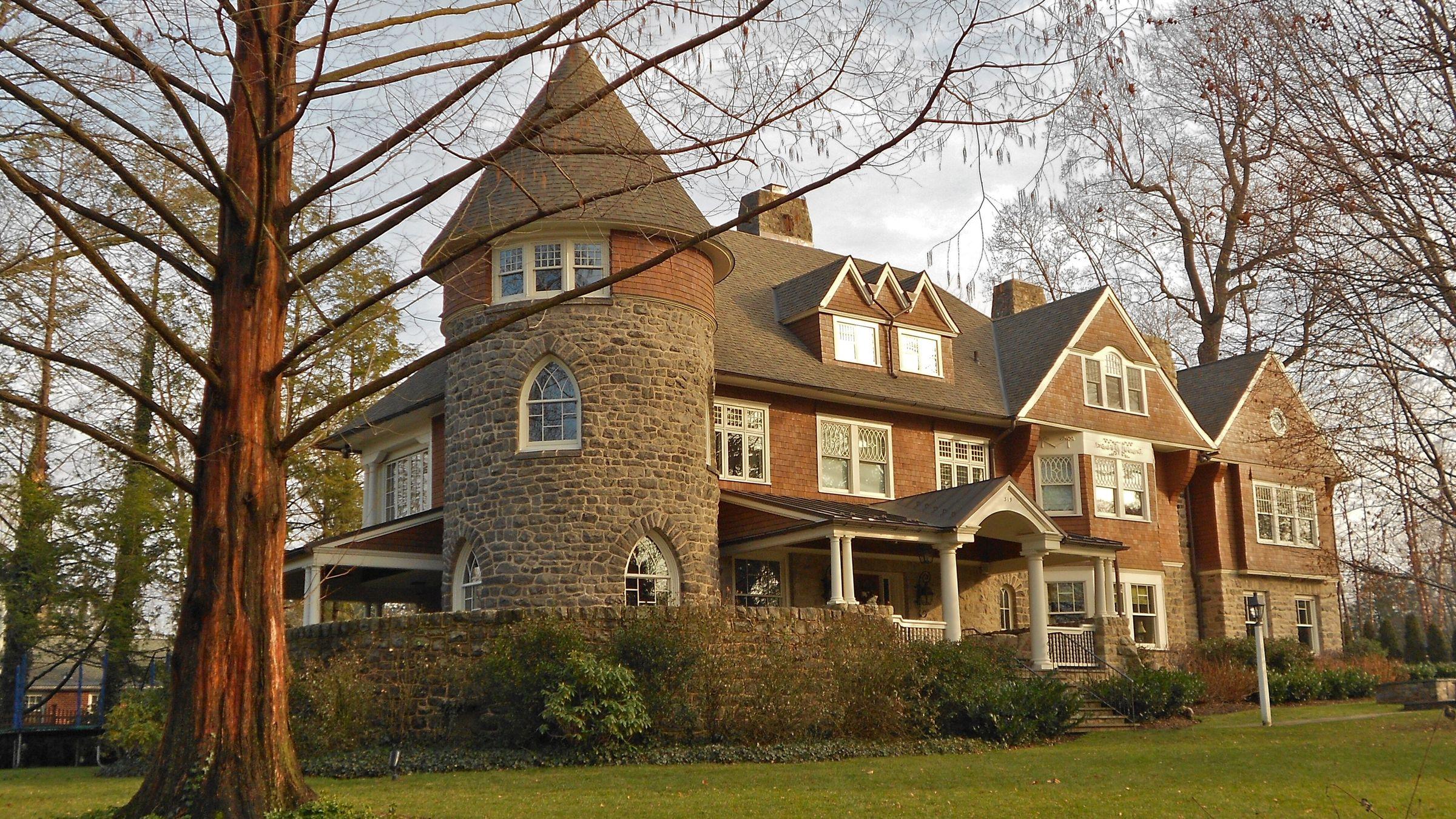 A stone-towered Victorian house in the South Wayne Historic District
